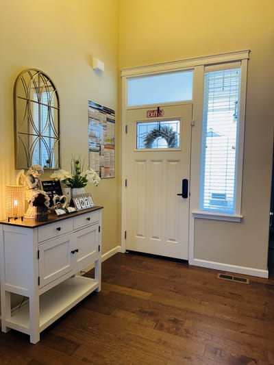 Bright entryway with a console table and decor