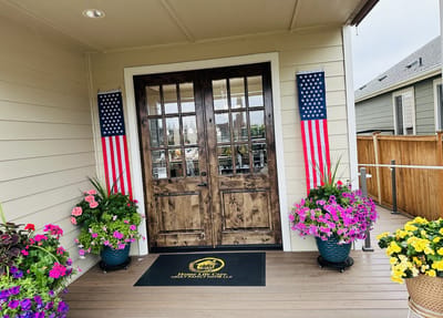 Entrance to Home Life Care Adult Family Home with flowers