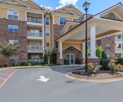 Front entrance of Galleria Manor with outdoor landscaping