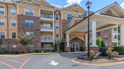 Exterior view of Galleria Manor with landscaped entrance
