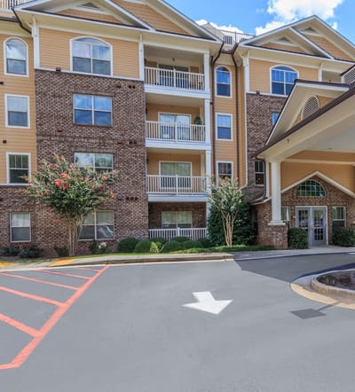 Exterior view of Galleria Manor with landscaped entrance