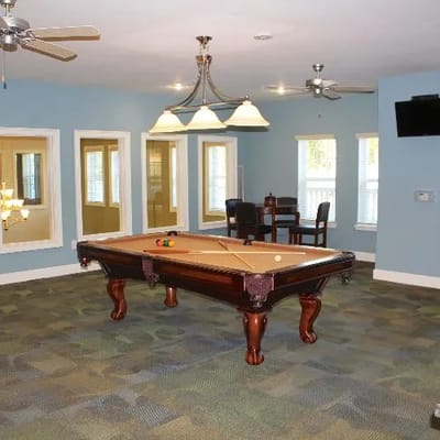 A pool table in a common area