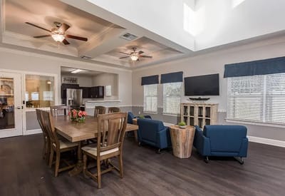 Bright dining area with seating and decor