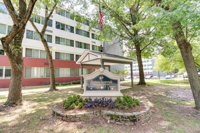 Exterior view of Lenox Summit Apartments sign and building