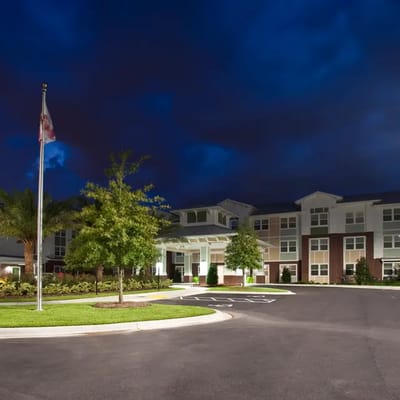 Exterior view of Kenwood Place Apartments at night