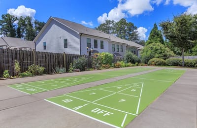 Outdoor shuffleboard court next to the building