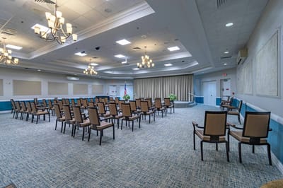 Interior of a multi-purpose room with rows of chairs