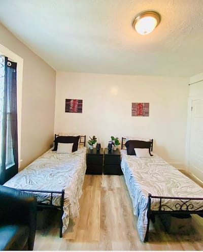 Cozy shared room with two beds and decor