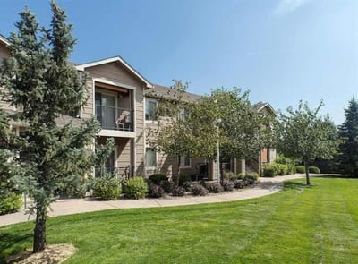 Exterior view of a residential building with landscaping