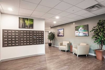 Interior view of a facility lobby with mailboxes