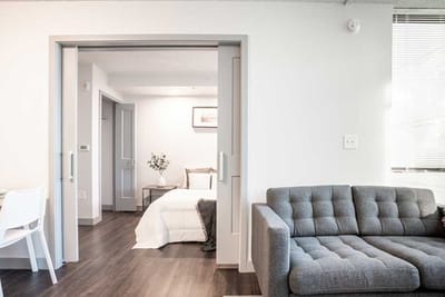 Cozy interior view of a resident room with a sofa