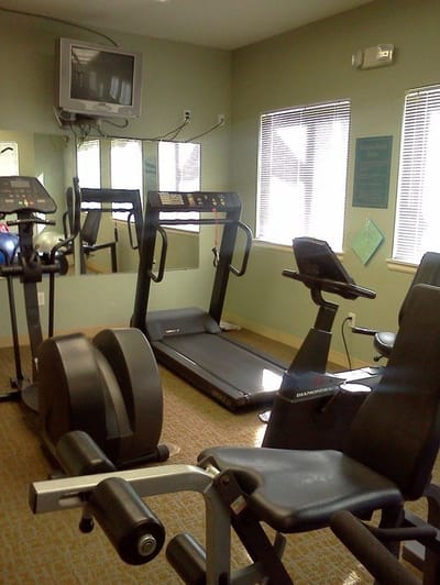 Interior view of a fitness area with exercise equipment