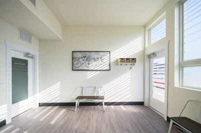 Bright interior corner with art and seating