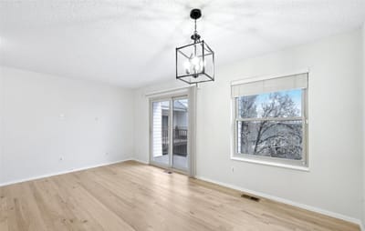 Bright, empty interior room with natural light