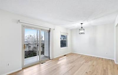 Bright, empty room with a balcony door