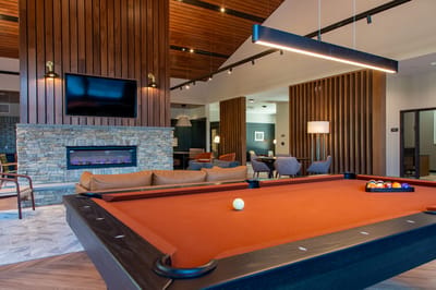 Interior view of a common area with a pool table