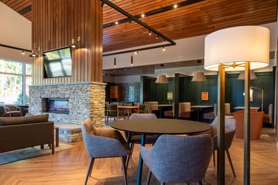 Cozy common area with seating and fireplace