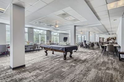 Common area with seating and pool table