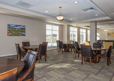 Bright dining area with tables and chairs