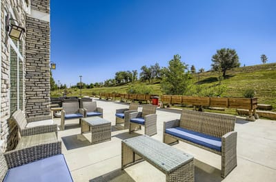 Outdoor seating area with patio furniture