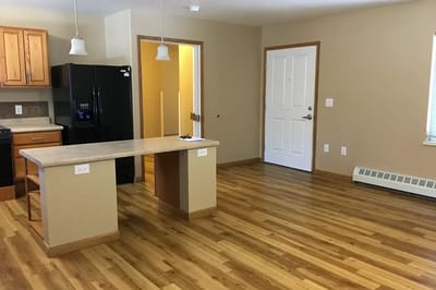 Interior view of a residential unit with kitchen and living space