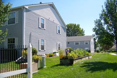 Exterior view of the Nellie Bechtel Apartments with gardens