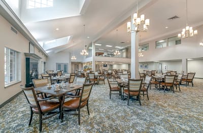 Bright dining area with tables and chairs