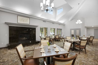 Bright dining area with tables set for meals