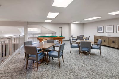Common area with seating and a pool table