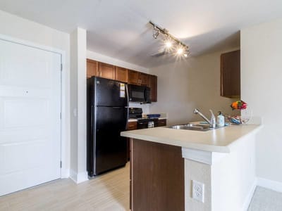 Bright interior view of a kitchenette in a senior living space