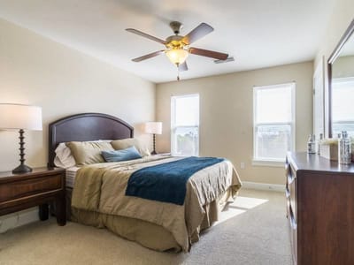 Brightly decorated private room with a modern bed setup