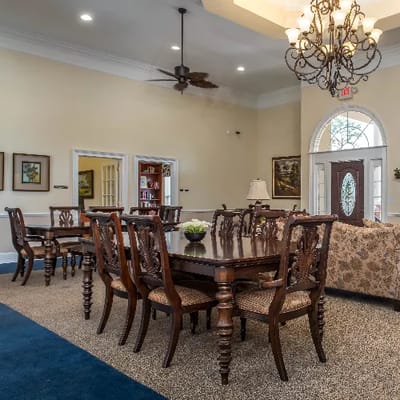 Elegant dining area with wooden tables and chairs