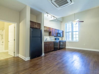 A spacious kitchen area in a resident unit