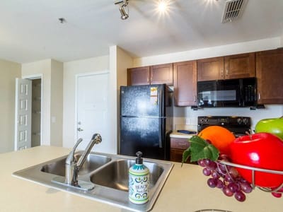 Bright kitchen interior with fresh fruits displayed