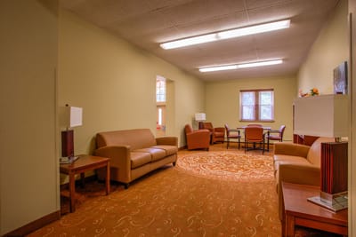 Common area with seating and natural light