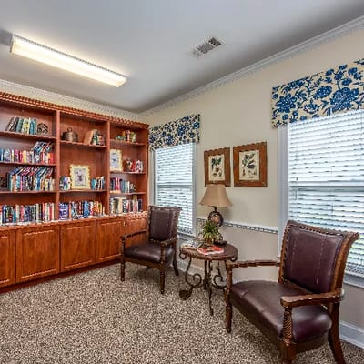 Cozy reading nook with shelves of books