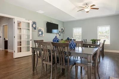 Bright dining room with tables and chairs