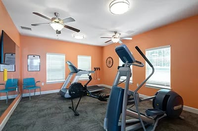 Interior view of a fitness room with exercise equipment