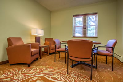 Cozy common area with seating and natural light