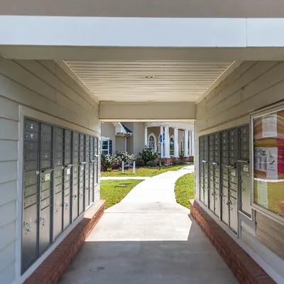 View of a covered walkway leading to the facility entrance