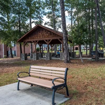 Outdoor gathering space with a gazebo in the background