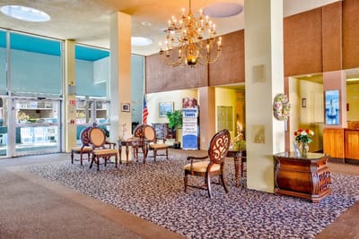 Bright lobby area with seating and decor
