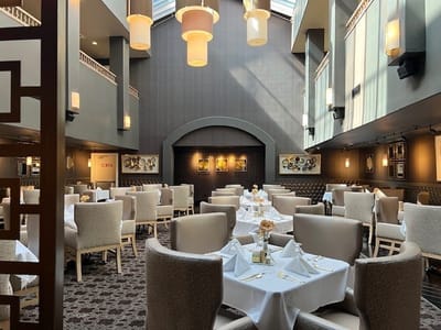 Elegant dining room setup with tables and decor