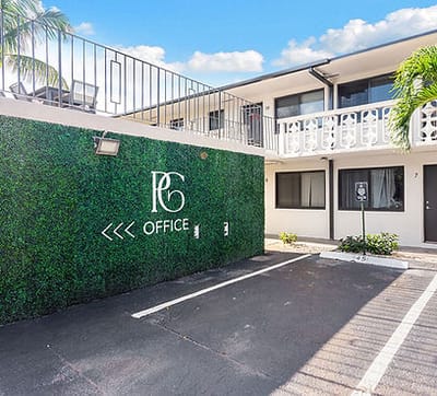 Building exterior with logo and office sign