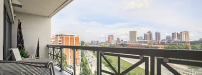 View from a balcony overlooking the city skyline