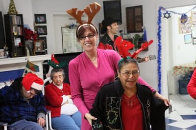 Residents celebrating during a holiday gathering