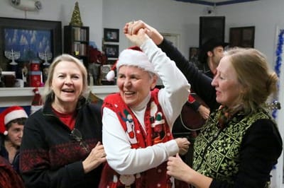 Residents celebrating with festivities during a holiday party