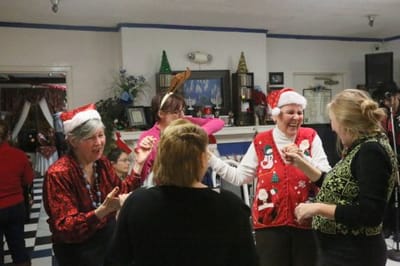 Residents celebrating with festive attire and decorations