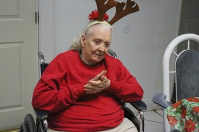 Resident wearing festive attire during an event