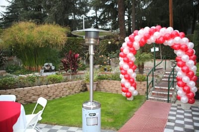 Outdoor garden space with decorative balloon arch